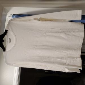 New white cotton long sleeve top.